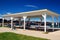 A pavilion offers shade at the beach