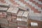 Paving slabs stands in a pile on the street