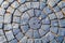 Paving. Square cobblestone circular pattern. Pavement in Vintage Design Flooring Square Pattern Texture Background.
