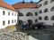 Paving works in the courtyard of medieval castle Palanok