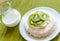 Pavlova meringue with kiwifruit slices