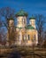 Pavlovsky Cathedral on a sunny spring day. The blue sky, green domes and the yellow walls of the cathedral. Gatchina