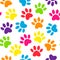 Paw print multicolored seamless. Vector illustration animal paw track pattern. backdrop with silhouettes of cat or dog footprint