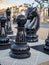 Pawn and knight chess pieces in giant chess set