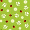 Paws pets with ladybug on green seamless pattern