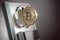 Pay by bitcoin concept. BItcoin coin and coin acceptor.