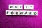 Pay It Forward alphabet letter on purple glitter background