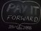 pay it forward word displayed on chalkboard concept