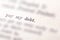 Pay my debt line in a book, printed word debt highlighted, selective focus, pointed out. Paying off debt reminder memo note