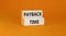 Payback time symbol. Concept words Payback time on wooden blocks. Beautiful orange table orange background. Business and payback