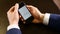 Payment notification on screen of a modern smartphone. Contactless payment. Closeup shot of male hands holding a mobile