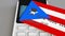 Payment or POS terminal with credit card featuring flag of Puerto Rico. Retail commerce or banking system conceptual