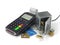 Payment terminal with credit card and safe with gold and money.