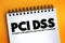 PCI DSS - Payment Card Industry Data Security Standard acronym text on notepad, IT Security concept background