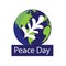 Peace day worldwide in September. A globe with a white leaf symbol in the center.