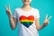 peace gesture pride month woman sign rainbow heart