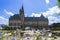 Peace Palace fountain and garden reflected on the calm water