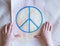 Peace sign, in baby`s hands, no war.