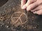 The peace symbol carved in wood with chisels. Peace concept, global solidarity
