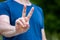 Peace victory sign - male person with blue shirt