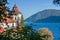 Peaceful autumn alpine Traunsee lake and Traunkirchen monastery church view, Upper Austria