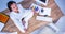 Peaceful businesswoman doing yoga sitting on floor