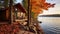 Peaceful cottage by the lake in autumn season