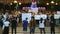 Peaceful crowd of activists standing with protest strike banners and placards.