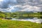 Peaceful English lake with rowing boats The Lakes Cumbria England