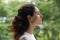 Peaceful happy young woman meditating with closed eyes.