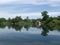 Peaceful lake with clouds reflected in water