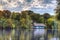 Peaceful lake view with old cabin on Herastrau lake