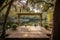 peaceful lakeside setting with outdoor dance floor surrounded by trees and wildlife