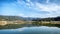 Peaceful landscape of clear reflective lake