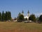 A peaceful landscape in the region of Medjugorje, Bosnia and Herzegovina, with the towers of the church of St. James in the