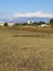 A peaceful landscape in the region of Medjugorje, Bosnia and Herzegovina, with the towers of the church of St. James in the