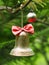 Peaceful minimal Christmas and New Year festival style decorative ornaments decorate on green pine tree in a lonesome home garden