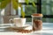 Peaceful morning scene featuring .glass jar filled with ground coffee, white coffee cup on sunlit table. Play of light, shadows