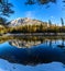 Peaceful mountain panorama view with Kreuzteich in Austria Styria. Tourist destination lake Gruner See in winter.