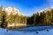 Peaceful mountain panorama view Pfarrerteich lake in Austria Styria. Tourist destination lake Gruner See in winter.