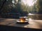 Peaceful outdoors scene of a tea cup on a bench by the lakeside