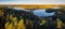 Peaceful panorama lake view with fall colors at Aulanko nature park in Finland