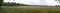 Peaceful panorama of moved meadows