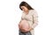 Peaceful pregnant woman checking belly