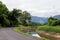 Peaceful road with canal in countryside