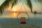 Peaceful Round Swing over paradise sandy beach with Ocean Water