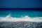 Peaceful sea wave foams on the beach, Aegean Sea, Rhodes, Greece.