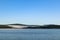 Peaceful and serene lake landscape with low-hanging clouds, Adirondacks, New York, USA