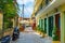 Peaceful street with sidewalk tables Lefkada town Greece