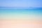 Peaceful summer, turquoise blue seawater and light blue sky, beautiful sand beach and gently waves, island background. Sunshine d